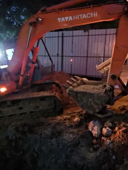An identical shot of the excavator at work. This is the foundational stage of our design and build process, preparing the site for the structure to rise.
