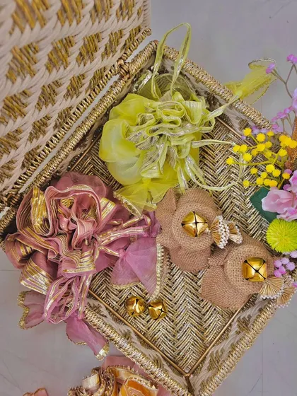 Another view of the handcrafted Sirohi box, showcasing how beautifully the festive potlis are arranged inside. This is thoughtful, sustainable gifting at its best.