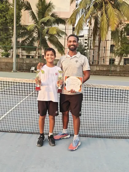Aarav Chhallani with his coach and his two runner-up trophies from the All India National Series in Hyderabad.