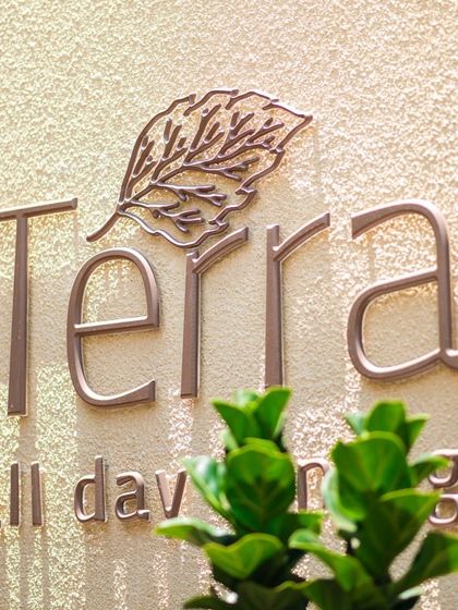 The elegant signage for our all-day dining restaurant, Terra, a name that reflects our connection to the earth and our farm-to-table philosophy.