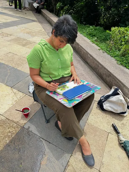 Me in my element, completely absorbed in painting during a sketch walk at Mindspace Garden. This is my happy place, sitting outdoors and bringing a scene to life with my brush.
