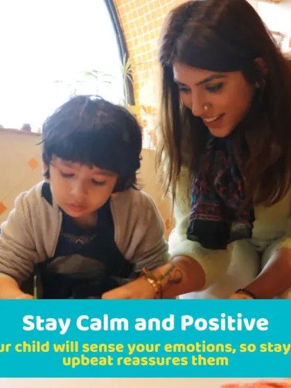 Your child senses your emotions, so staying calm and positive is key. Here, a mother offers gentle encouragement, creating a reassuring and happy environment.