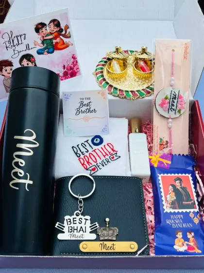My Raksha Bandhan hampers are always a hit. This one is packed with goodies for a brother, including a personalized bottle, wallet, and keychain, along with a custom photo chocolate bar and a "Best Bhai" rakhi.