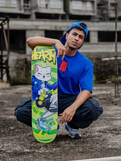 Me with the finished Hearty Skateboards deck. It was a fun challenge to create a design that speaks to both the skate and graffiti communities.