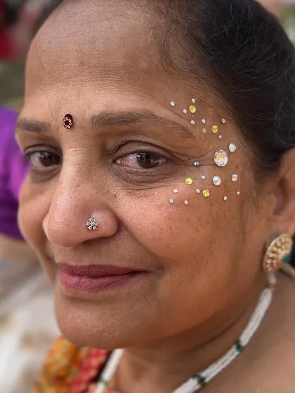 What I mean when I say my art is for every age group. This lovely aunty was so happy with her beautiful rhinestone design.