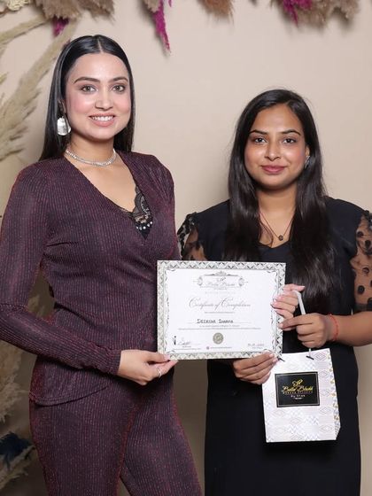 A student receiving her certificate. My goal is to empower every student with the skills they need for a successful career.