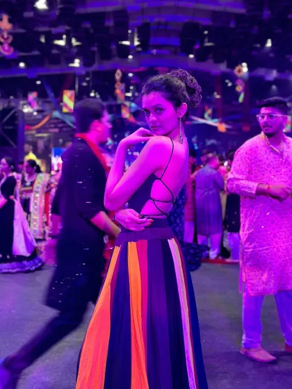 A playful pose during a Garba night. My Navratri dance workouts are filled with these kinds of fun, expressive moves that capture the spirit of the festival.