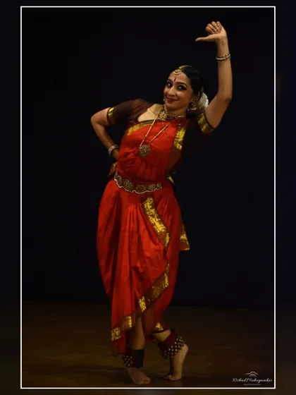 This pose, depicting pride or confidence, is part of the expressive vocabulary of Bharatanatyam. It's from a performance where I portrayed a strong, divine character.