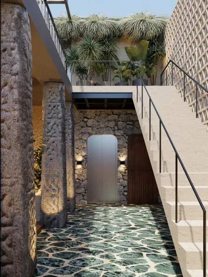 Another angle of the staircase, highlighting the contrast between the rough stone walls and the smooth, modern steps. The design artfully weaves together rustic and contemporary elements.