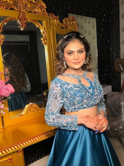 A full view of the party look. The client looks confident and beautiful.