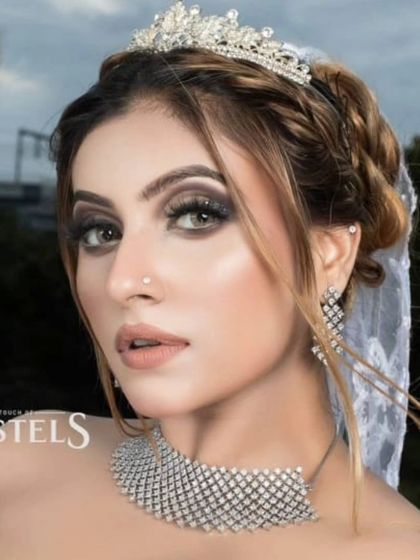 A model styled as a Western bride, wearing a diamond choker and a tiara. This shows the versatility of my jewellery for different themed shoots and events.