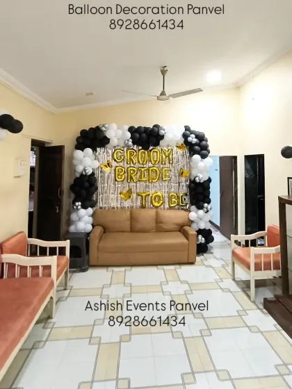 A wider view of the 'Groom to be Bride to be' decoration, showing how it fits into a home living space.