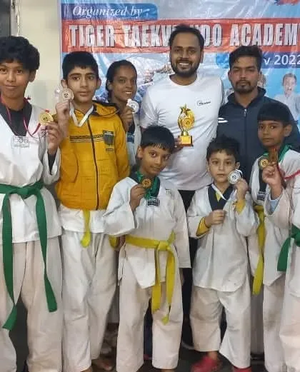 Another shot of our victorious team. We believe in celebrating our collective achievements.
