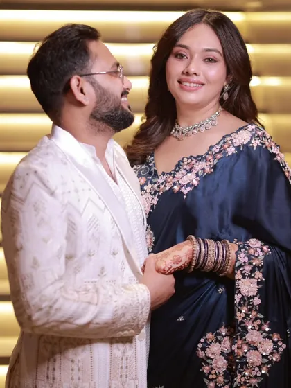 A candid, happy moment. My goal is always to make sure the drape feels so natural that you forget you are wearing it.