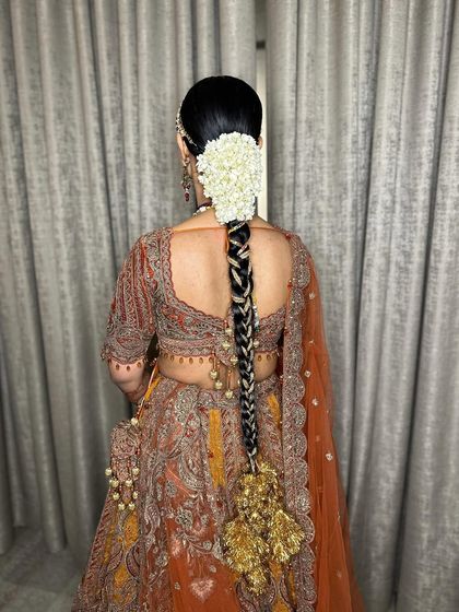 A final shot of the traditional bridal braid, a perfect choice for a grand wedding ceremony.