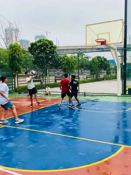 A player takes a shot from the perimeter.