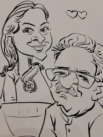 The final caricature of a lovely couple. Every stroke tells a story, and every smile is a reward. This is art that connects.