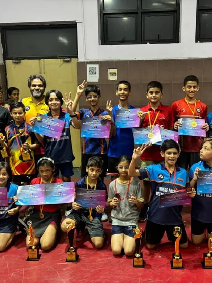The pure joy of competition. A huge group of my young Alightians celebrating with their certificates and trophies. Every player who participates goes home with a medal.