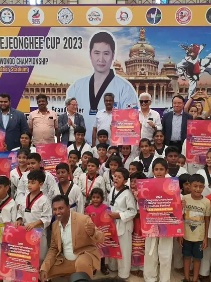 Our coach posing with the young students. We aim to be approachable and inspiring leaders for the next generation of athletes.