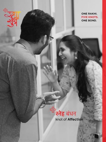 This image captures the 'Sneh Bandhan' or the knot of Affection. It represents the easy laughter and comfort of growing up side by side with a sibling and never growing apart.