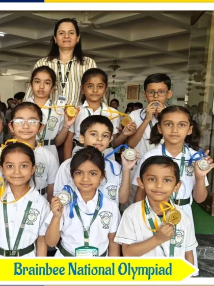 Anusha Jain from DPS Agra with her Champions Trophy for Drawing and Colouring in the 2024 Olympiad.