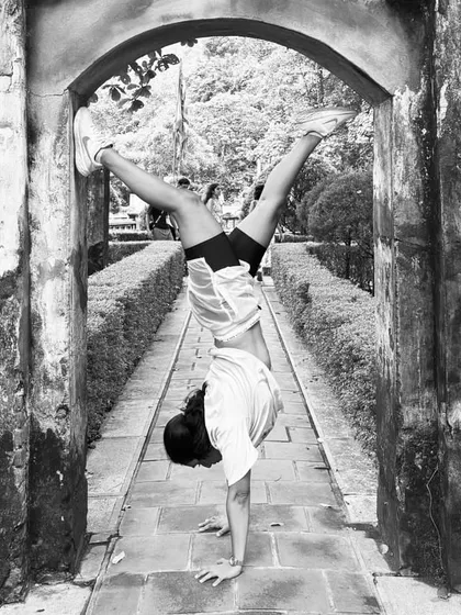 The black and white version of my handstand in Vietnam. It's a reminder that yoga is an adventure, a way to see the world from a new perspective.