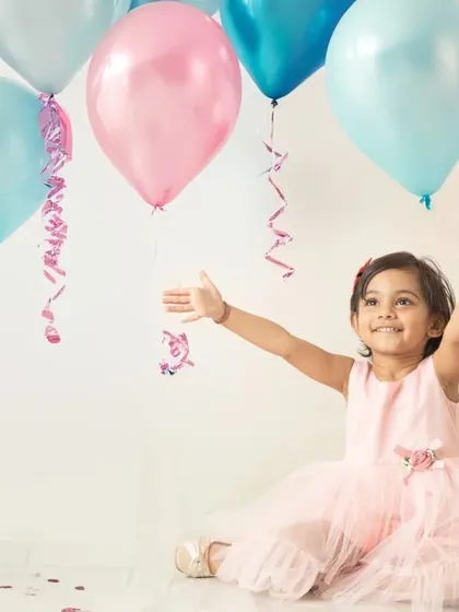 Simple, classic, and full of joy. A session with colorful balloons is a timeless way to capture the playful spirit of a birthday celebration.