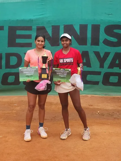 The winner and runner-up of the girls' doubles at the 4th Shri Rajesh Patel Memorial Super-Series AITA Tennis Tournament.