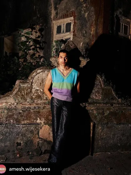 Another shot from the Amesh Wijesekera editorial, set against an old wall in Bandra. The grooming is understated and authentic.