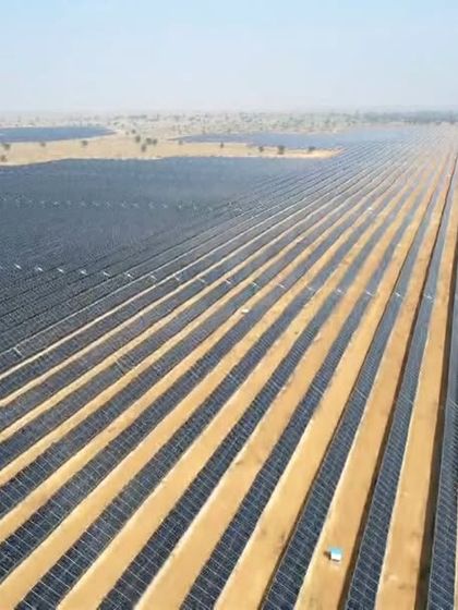 Rows of solar panels at Project JAI, engineered for maximum energy generation. This project has generated over 755 million units of clean energy in its first year, demonstrating our capability in delivering high-performing utility-scale assets.
