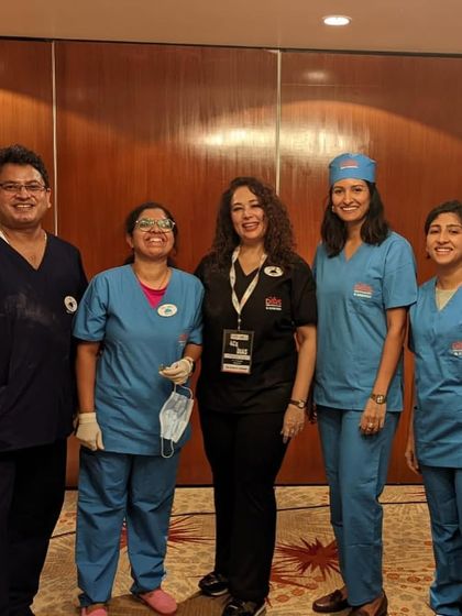With my fellow dermatologists at a DIAS training event. The camaraderie and shared learning experience make these workshops incredibly valuable.