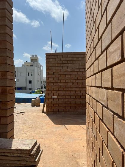More scenes from our construction sites. These images document the journey of building, from laying rebar and curing concrete to the meticulous work of masonry, all part of bringing a sustainable home to life.