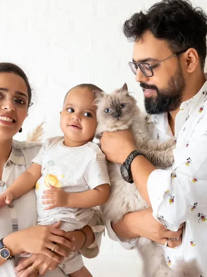A complete family portrait that includes the beloved family cat. I welcome pets in my studio sessions to ensure every member of your family is part of the memory.