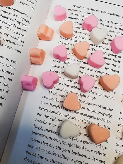 A close-up of our Galentine's Day heart wax melts. The different shades of pink and white are so pretty.