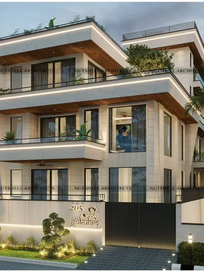 This residence achieves a timeless Indian aesthetic through its material palette. We used a combination of Gwalior Mint and Moca Cream stones for the facade, complemented by layered rooflines and integrated lighting to create an aura of classic luxury.