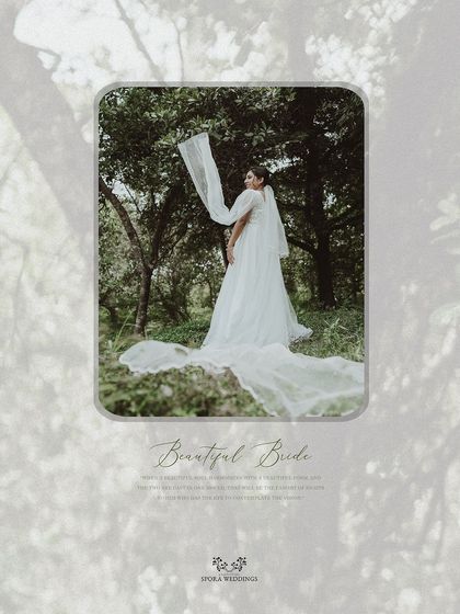 A beautifully designed portrait of the bride in a forest, her veil creating a sense of movement and grace.