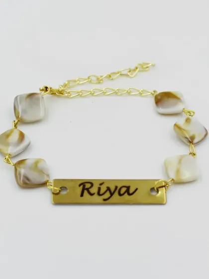 A clear, full view of the custom name bracelet with square beads, showing the adjustable chain and high-quality finish.