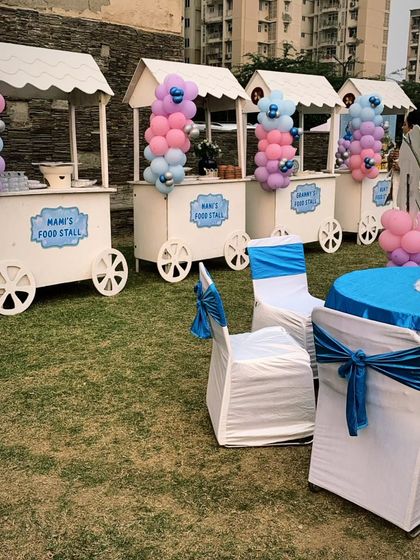 I love creating themed parties for kids! For this birthday, I designed 'Frozen' movie-themed food stalls and decor, making the celebration extra special for the little ones.