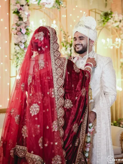 The Varmala exchange is a moment of joy and union. I focus on the expressions of the couple as they perform this beautiful ritual.