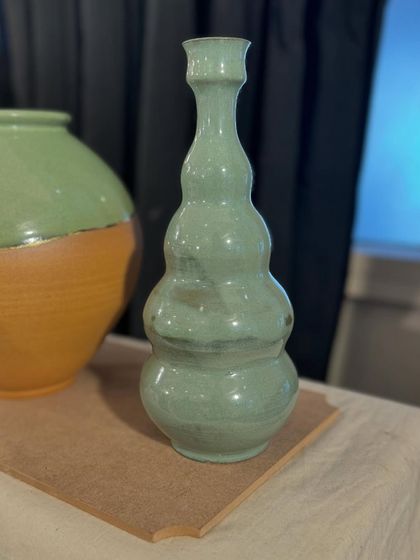 A few of my favorite finished vases from a recent collection, featuring a variety of glazes, painted details, and forms. Each one has its own personality.