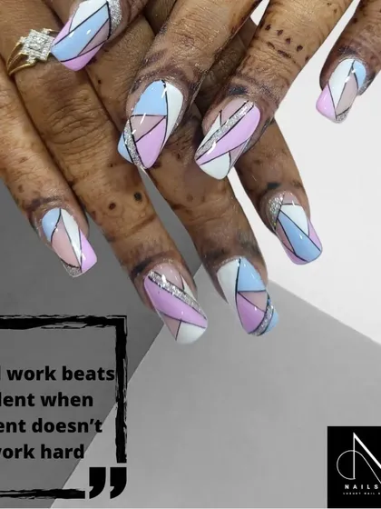 This geometric design uses a pastel color palette for a softer look. The sharp lines and color blocking in pink, blue, and white are accented with a touch of silver glitter.