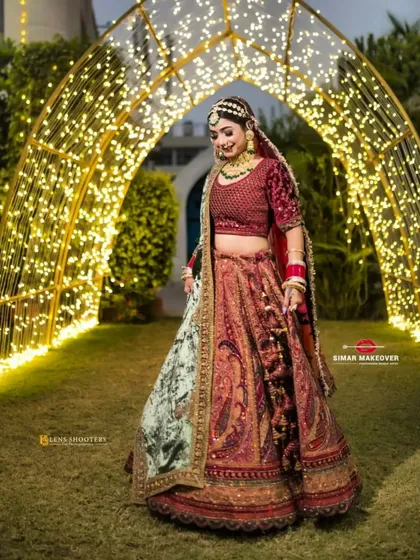 Here is another view of my multi-color bridal lehenga, showing how beautifully it drapes. The combination of a velvet blouse and intricately embroidered skirt makes it a true statement piece for your wedding.