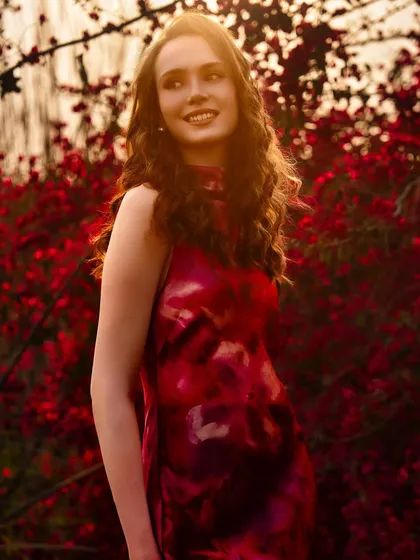 Shot during the golden hour, this portrait is a perfect harmony of subject and setting. We learn to use natural light and the environment to complement the styling and create a soft, romantic mood.