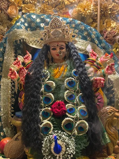 This full view shows the complete look of the deity with the Mayur Kanthi. The garland is designed to be long and impressive, adding a royal touch to your Navratri pooja setup.