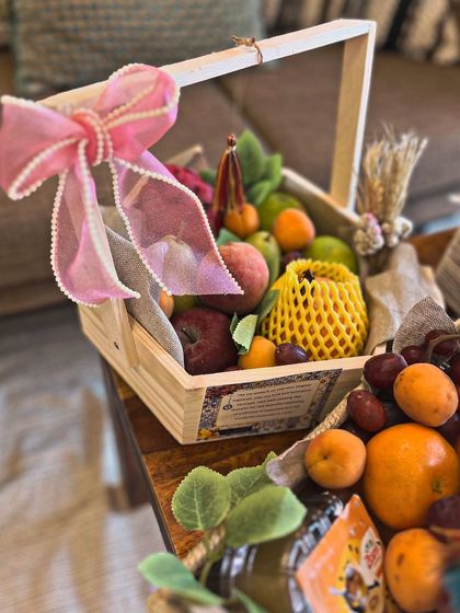 For a Roka trousseau, I went with a Moroccan-inspired evil eye theme. This fruit basket is just one part of a larger collection where every detail, from burlap wraps to fairy lights, tied the whole look together.