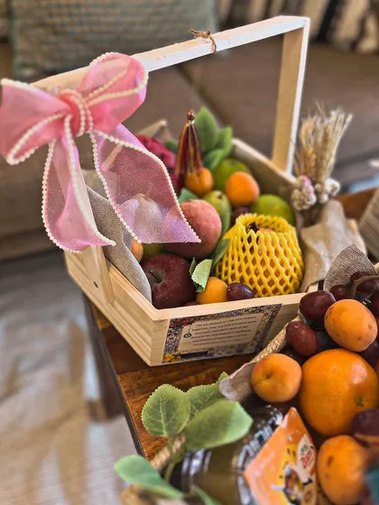 For a Roka trousseau, I went with a Moroccan-inspired evil eye theme. This fruit basket is just one part of a larger collection where every detail, from burlap wraps to fairy lights, tied the whole look together.
