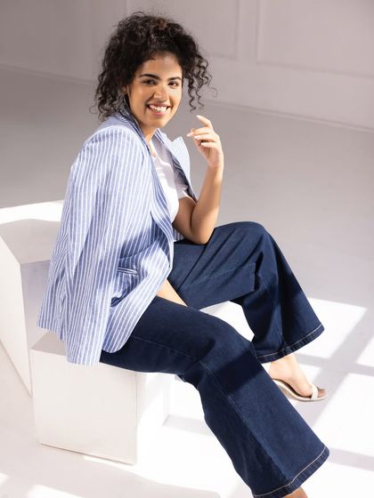 A classic, confident look for Fable Street. Here I'm modeling a smart-casual outfit with a striped blazer and flared denim, perfect for their workwear-to-weekend collections.