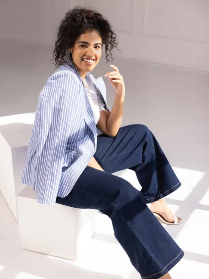 A classic, confident look for Fable Street. Here I'm modeling a smart-casual outfit with a striped blazer and flared denim, perfect for their workwear-to-weekend collections.