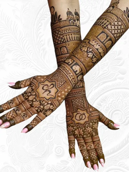 This full-arm engagement mehendi shows how I can personalize your design. It includes the couple's initials, intertwined rings, and a beautiful mix of traditional motifs like elephants and architectural domes.