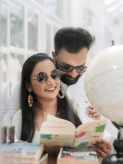 A cute and quirky shot with sunglasses. The makeup is still flawless, with a focus on a perfect lip and radiant skin.